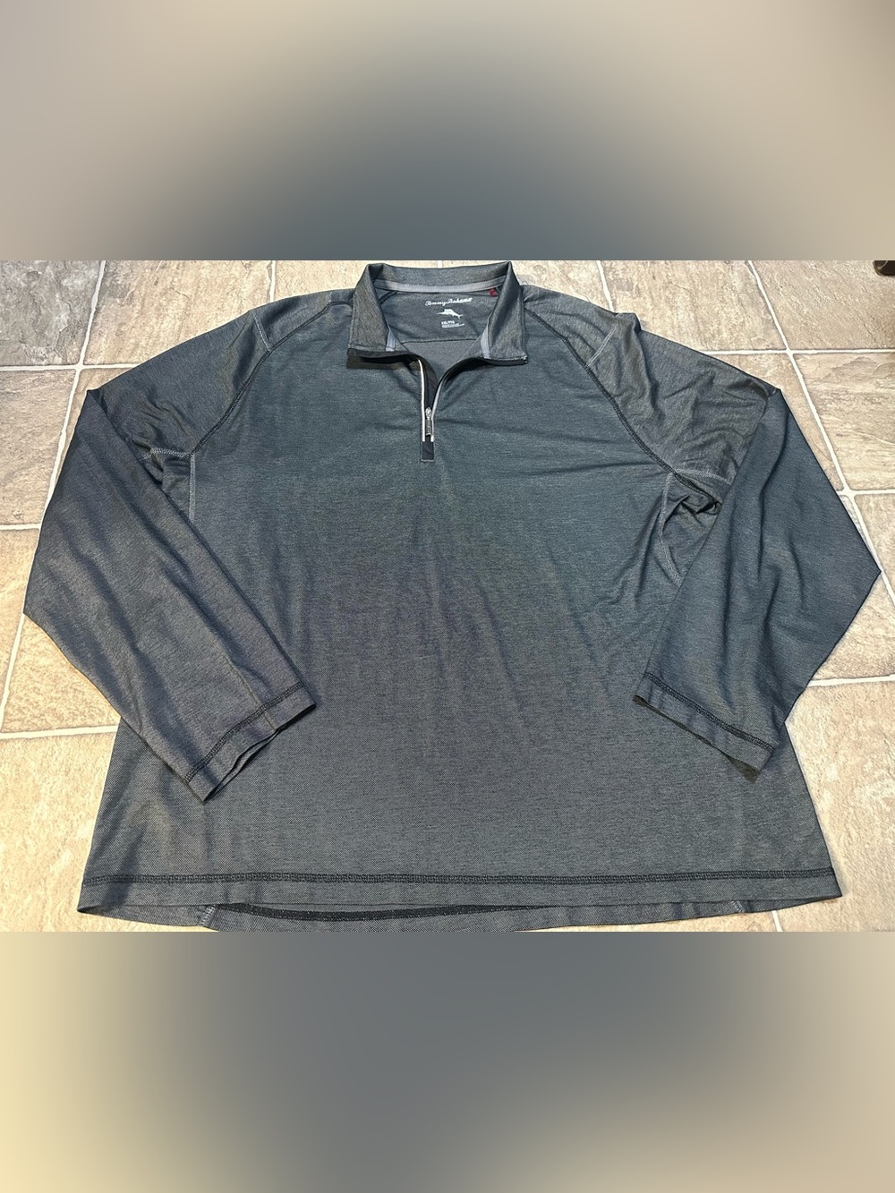 Tommy Bahama black marl textured half-zip pullover featuring a mock neck collar
